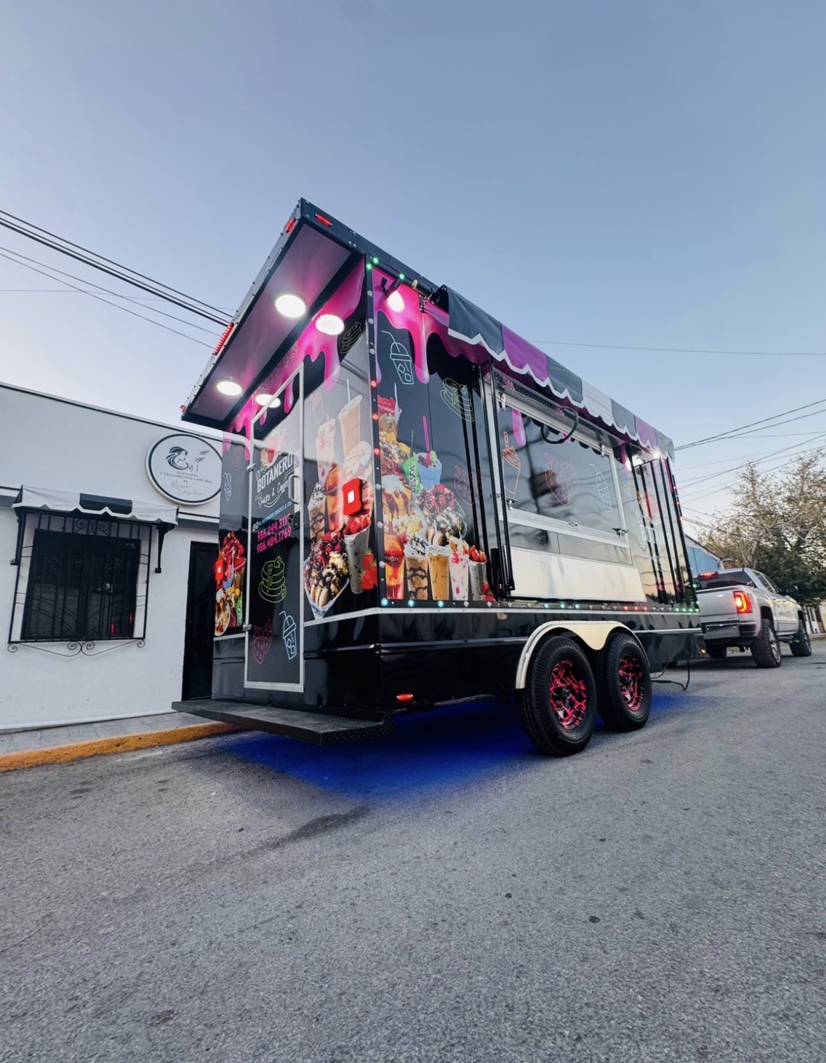 Botanero custom dessert and snacks trailer with pink LED lighting