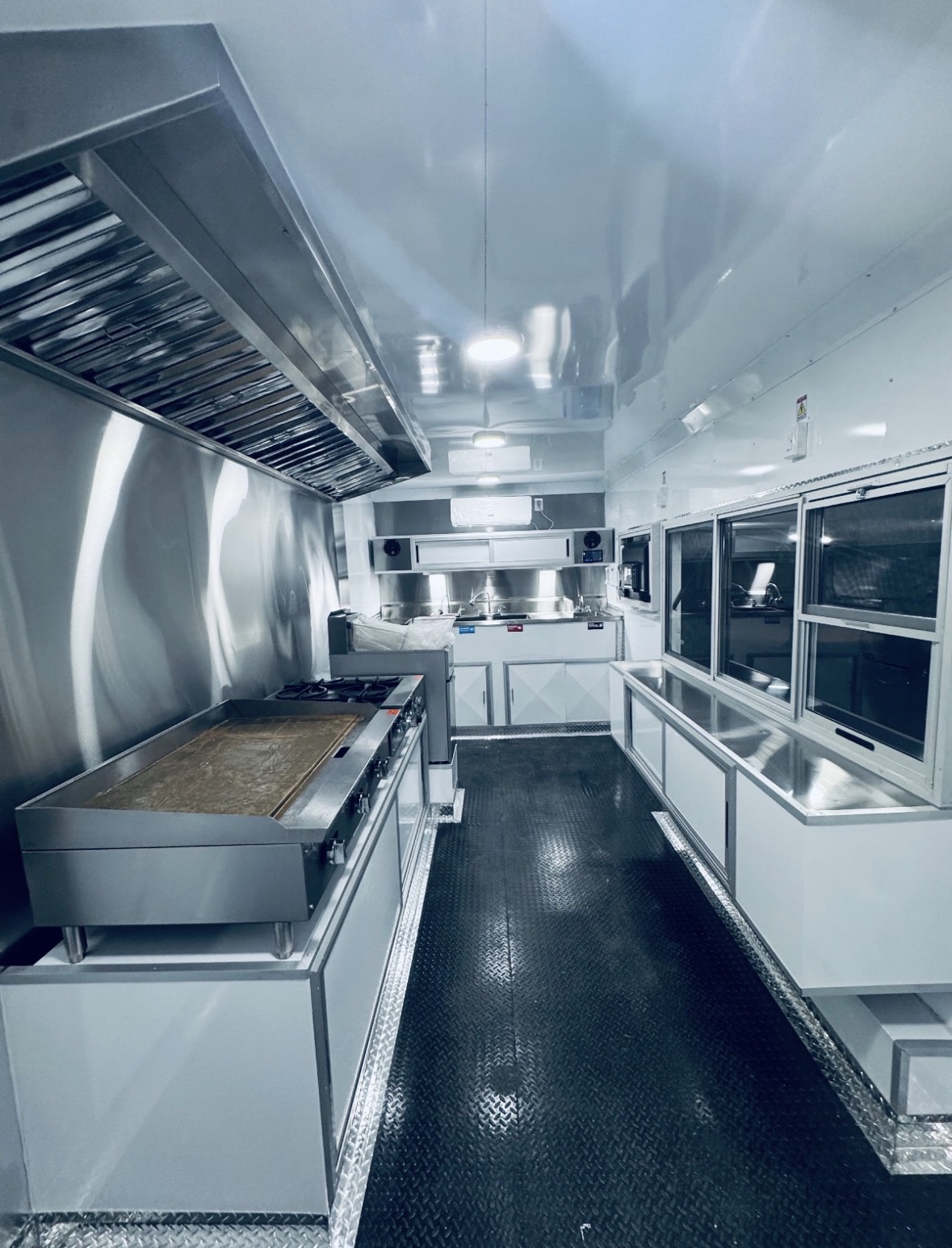 Griddle and hood installation inside a food trailer